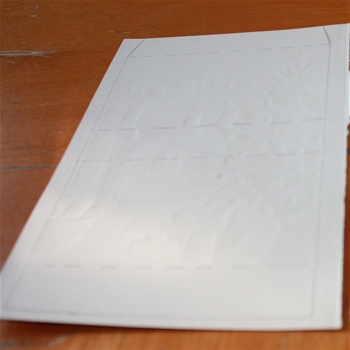 tracing the gift box template top onto cards